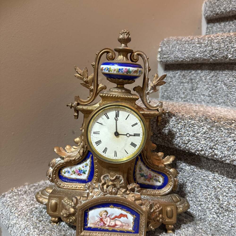 French 19th century ormolu salon clock having cherubs